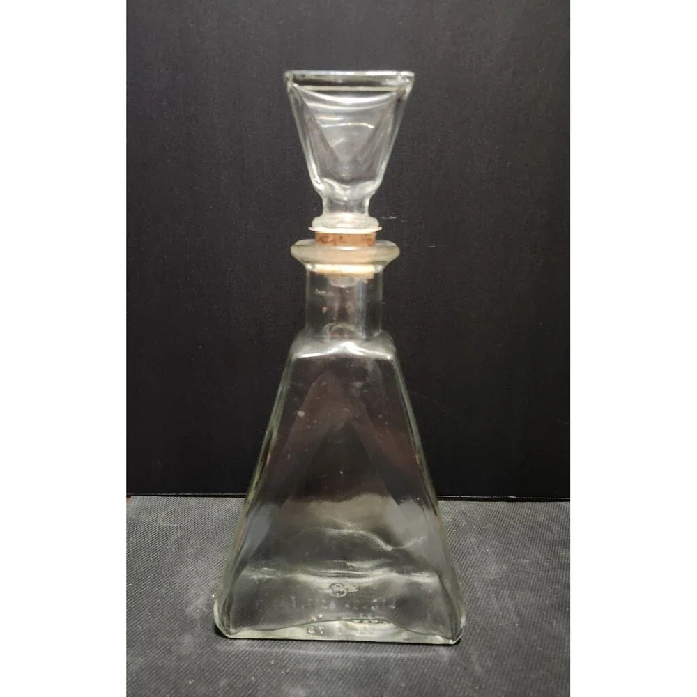 Clear Glass Triangle Decanter, 1 Quart. The cork is damaged. MAKE OFFER,